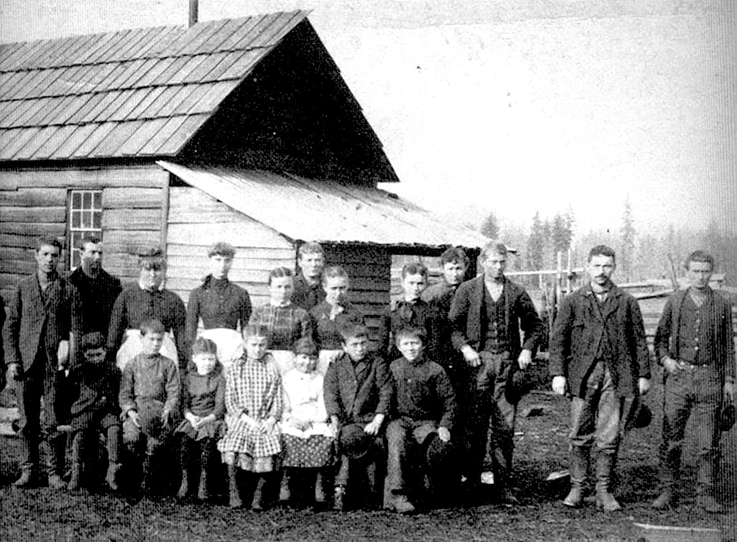 The first Pe Ell school was built in 1884 and was located, approximately, at the intersection of Mauerman Road and Leach Road, 1.5 miles northeast from Pe Ell. It later moved to the Kroll farm, which was used to house pigs. This happy bunch are some of the first settlers of Pe Ell. Those pictured from the left of the back row include Bill Hendrick, Mauermann, Charley Damitz, Cal Carron, Emma Mauermann, May Hendrick, Stearns (teacher’s friend) and Erve and Maine Willard. Those pictured from the left of the front row include Albert and Charley Mauermann, Daisy and Hattie Hendrick, Verna Jones, Bruce Jones and Frank Hadley.